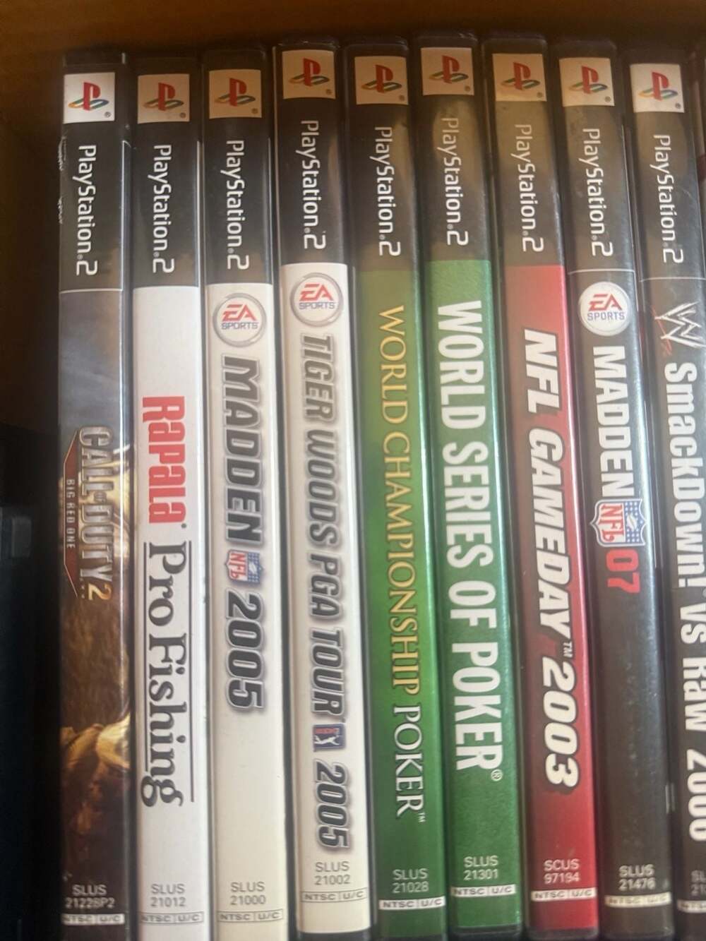 Lot of 40 Assorted PlayStation 2, PS3, and PS4 Video Games AND PS2 slim retro vt